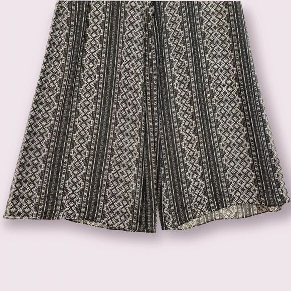 BCBGeneration Sleeveless Wide Leg Jumpsuit Size XS Sheer Black Print Summer Chic - Picture 8 of 13